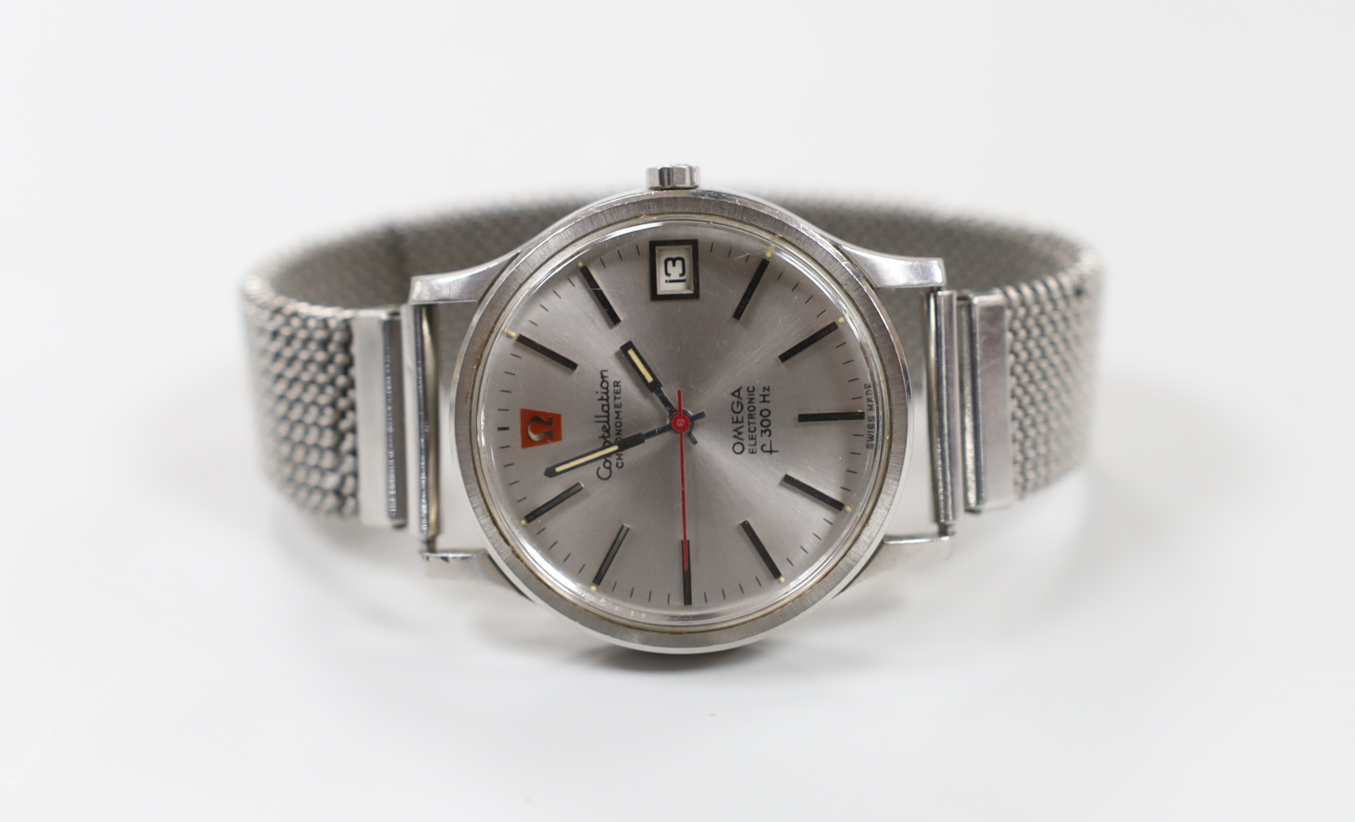 A gentleman's stainless steel Omega Constellation Electronic F300 Hz wrist watch, on an associated flexible strap.